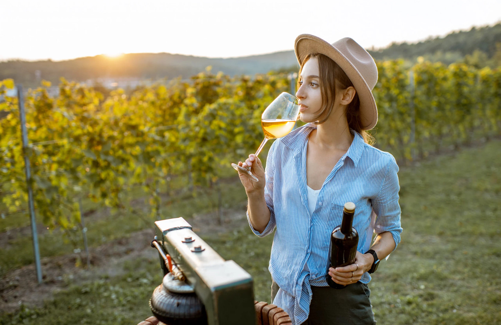 100woman-tasting-wine-on-the-vineyard-2022-01-18-23-48-06-utc woman tasting wine on the vineyard